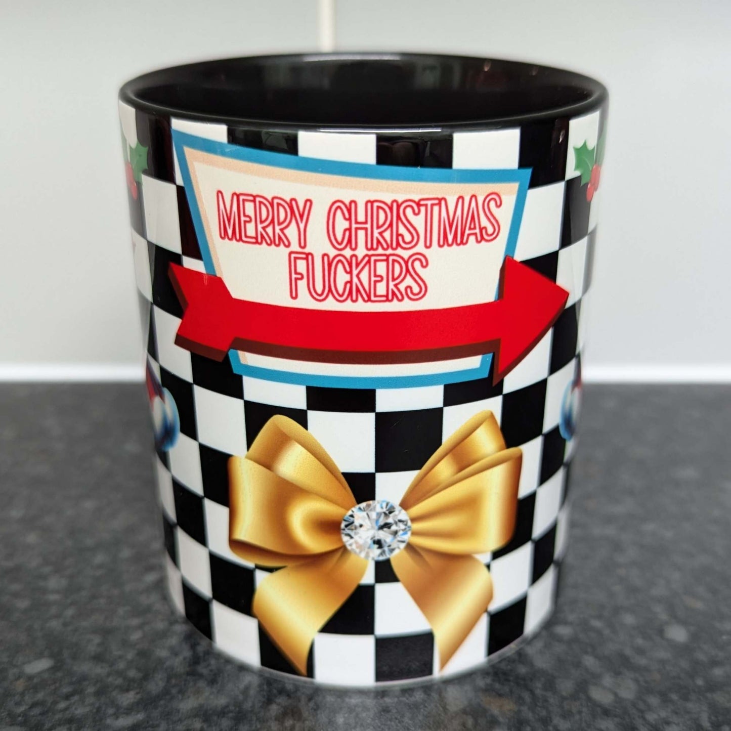 Merry Christmas F*ckers Cheeky Festive 1950s Style Pin-Up Mug – 11oz Black Handle – Funny Holiday Gift for Adults Limited Edition