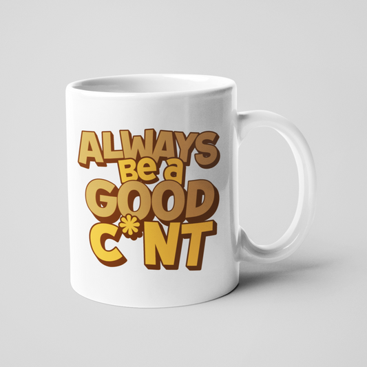 White ceramic mug with the phrase "Always Be a Good C*nt" printed in bold brown letters on both sides. 11oz size with a classic white handle and matching white interior. Perfect for coffee, tea, or gifting with a cheeky twist.