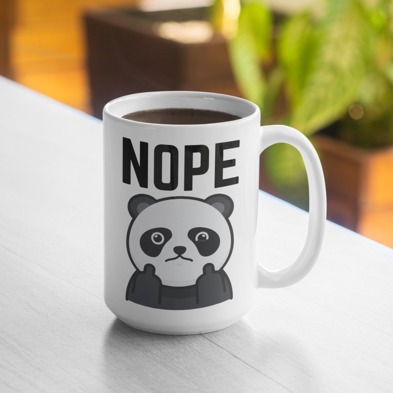 Take a stand for the things you believe in with this Nope Swearing Middle Fingers Panda Coffee Mug! Boldly declare your stance with this fun design and challenge yourself with every sip. Featuring a panda bear giving the middle finger, this mug is perfect for the risk-taker and the rebel in you!